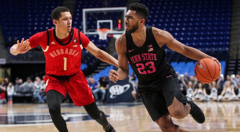 Feb 19, 2019; University Park, PA, USA; Penn State Nittany Lions guard Josh Reaves (23) dribbles the ball around Nebraska Cornhuskers guard Amir Harris (1) during the first half at Bryce Jordan Center. Feb 19, 2019; University Park, PA, USA; Penn State Nittany Lions guard Josh Reaves (23) dribbles the ball around Nebraska Cornhuskers guard Amir Harris (1) during the first half at Bryce Jordan Center.