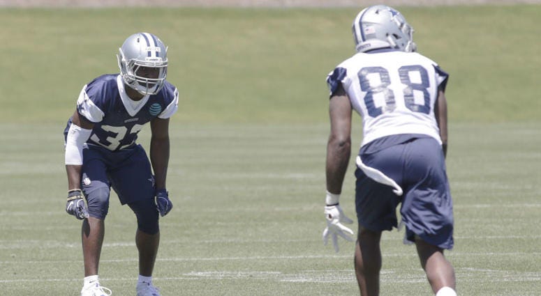 Dallas Cowboys cornerback Chidobe Awuzie (33) defends against wide receiver Dez Bryant (88) in practice at the Star in Frisco. Dallas Cowboys cornerback Chidobe Awuzie (33) defends against wide receiver Dez Bryant (88) in practice at the Star in Frisco.