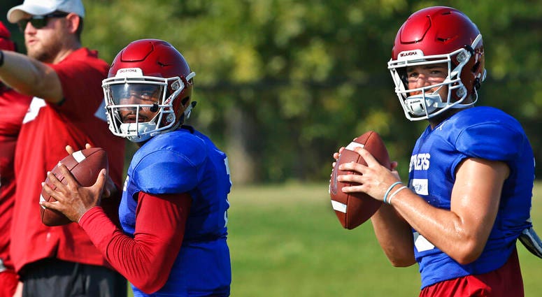 Oklahoma quarterbacks Jalen Hurts, left, and Tanner Mordecai Oklahoma quarterbacks Jalen Hurts, left, and Tanner Mordecai