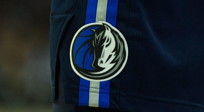 The Dallas Mavericks logo The Dallas Mavericks logo