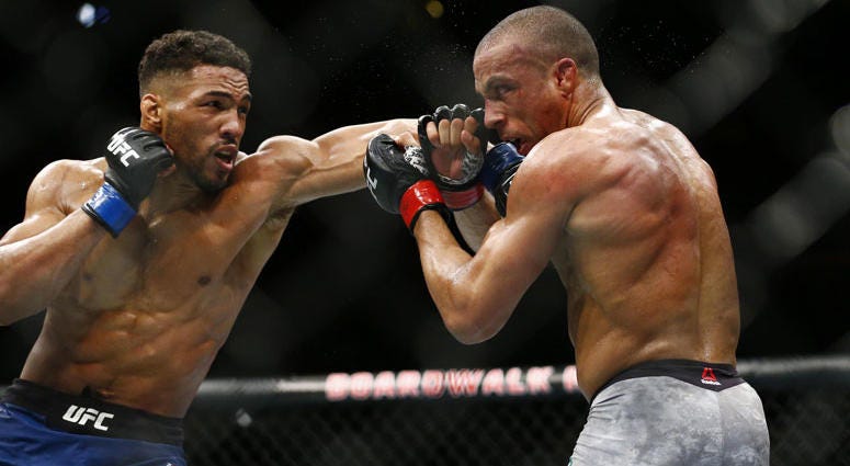 Edson Barboza (red gloves) fights Kevin Lee (blue gloves) during UFC Fight Night at Atlantic City Boardwalk Hall. Edson Barboza (red gloves) fights Kevin Lee (blue gloves) during UFC Fight Night at Atlantic City Boardwalk Hall.