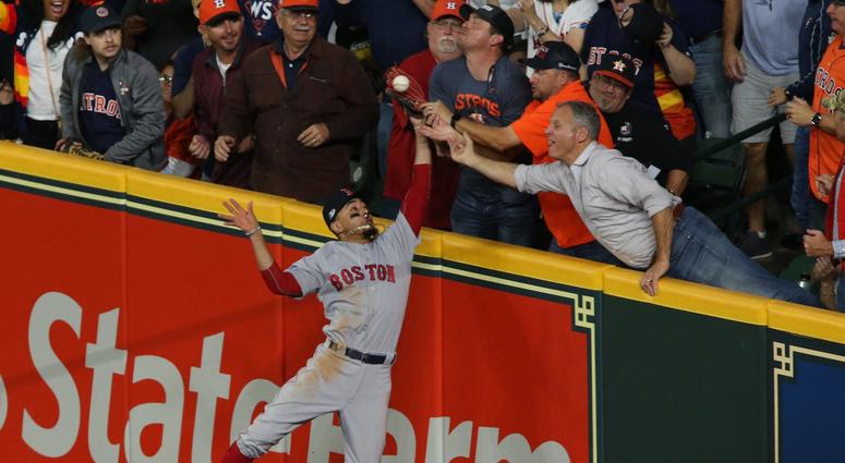 Boston Red Sox at Houston Astros Houston Astros second baseman Jose Altuve (27, not pictured) is called out after a fan interfered with Boston Red Sox right fielder Mookie Betts (50) catch during the first inning in game four of the 2018 ALCS playoff baseball series at Minute Maid Park.