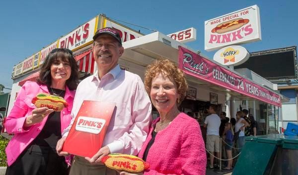 Pink's Hot Dogs owners Gloria and Richard Pink, and Beverly Pink-Wolfe