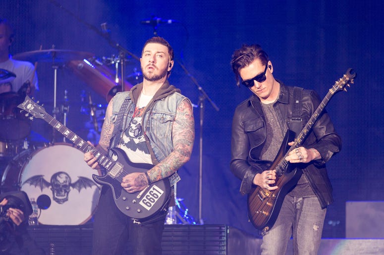Zacky Vengeance (Zachary Baker) and Synyster Gates (Brian Haner, Jr.) of Avenged Sevenfold performs live at U.S. Bank Stadium in Minneapolis, Minnesota Zacky Vengeance (Zachary Baker) and Synyster Gates (Brian Haner, Jr.) of Avenged Sevenfold performs live at U.S. Bank Stadium in Minneapolis, Minnesota