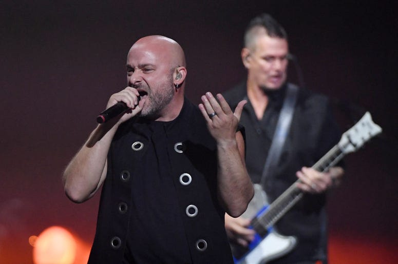Singer David Draiman (L) and guitarist Dan Donegan of Disturbed perform at T-Mobile Arena on January 12, 2019 in Las Vegas, Nevada Singer David Draiman (L) and guitarist Dan Donegan of Disturbed perform at T-Mobile Arena on January 12, 2019 in Las Vegas, Nevada