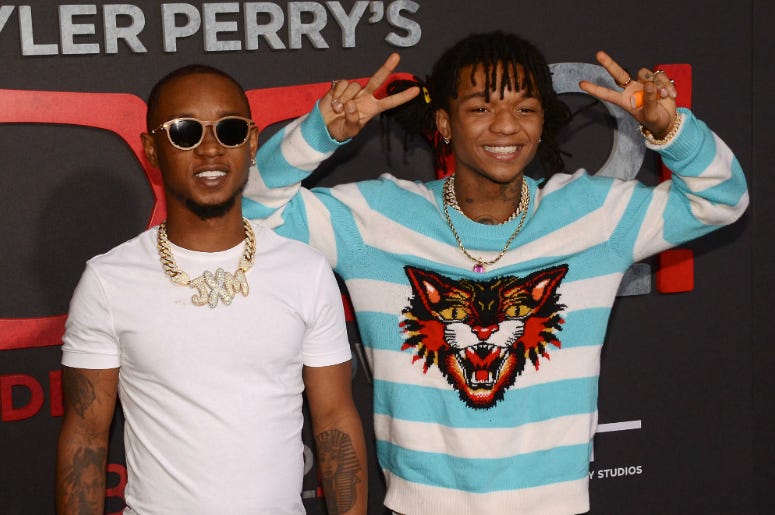 SWAE LEE and SLIM JXMMI. "Tyler Perry's Boo 2! A Madea Halloween" Los Angeles Premiere held at Regal LA Live Stadium 14. SWAE LEE and SLIM JXMMI. "Tyler Perry's Boo 2! A Madea Halloween" Los Angeles Premiere held at Regal LA Live Stadium 14.
