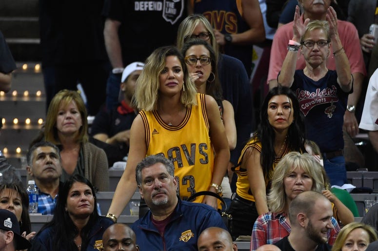 June 9, 2017; Cleveland, OH, USA; TV personalities Khloe Kardashian (left) and Kourtney Kardashian (right) during the second quarter in game four of the 2017 NBA Finals between the Golden State Warriors and the Cleveland Cavaliers at Quicken Loans Arena.