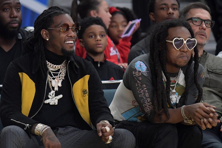 Feb 16, 2018; Los Angeles, CA, USA; Recording artists Offset (left) and Takeoff of Migos attend the NBA All-Star Celebrity Game at the Los Angeles Convention Center. Mandatory Credit: Kirby Lee-USA TODAY Sports