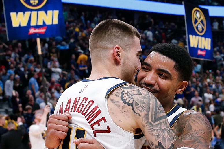 Oct 21, 2018; Denver, CO, USA; Denver Nuggets forward Juancho Hernangomez (41) celebrates with guard Gary Harris (14) after the game against the Golden State Warriors at the Pepsi Center. Mandatory Credit: Isaiah J. Downing-USA TODAY Sports