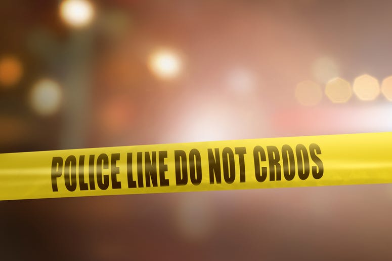 Yellow police line tape sign for protection crime scene