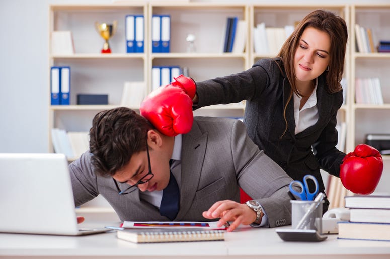 The office conflict between man and woman. Boxing, business.
