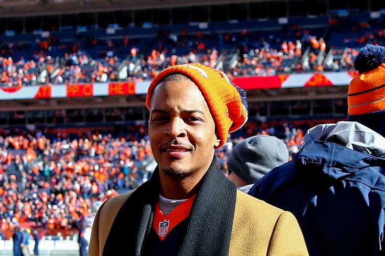 Jan 24, 2016; Denver, CO, USA; Hip hop recording artist and entertainer T.I. before the game between the Denver Broncos and New England Patriots in the AFC Championship football game at Sports Authority Field at Mile High. Mandatory Credit: Kevin Jairaj-U