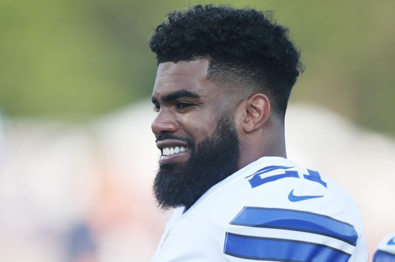 Aug 3, 2017; Canton, OH, USA; Dallas Cowboys running back Ezekiel Elliott (21) reacts during warms up before playing the Arizona Cardinals at Tom Benson Hall of Fame Stadium. Mandatory Credit: Charles LeClaire-USA TODAY Sports