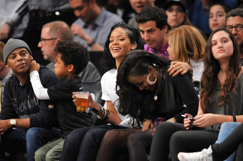 Jan 10, 2014; Brooklyn, NY, USA; Singer Rhianna attends the game between the Brooklyn Nets and the Miami Heat during the second half at Barclays Center. The Brooklyn Nets won the game 104-95 in double overtime. Mandatory Credit: Joe Camporeale-USA TODAY S