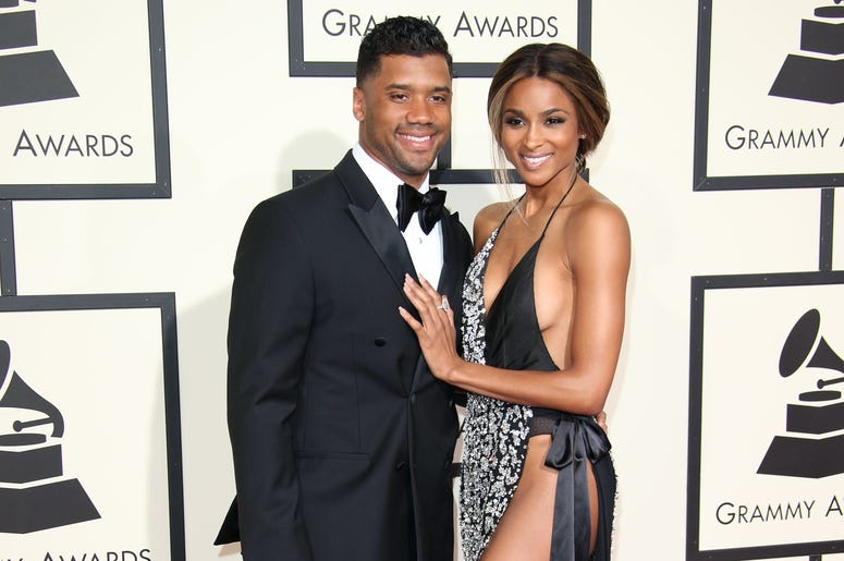 Feb 15, 2016; Los Angeles, CA, USA; Russell Wilson (left) and Ciara arrive on the red carpet during the 58th Grammy Awards at the Staples Center. Mandatory Credit: Dan MacMedan-USA TODAY NETWORK