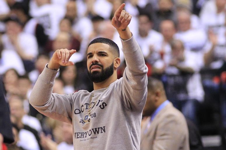 Apr 17, 2018; Toronto, Ontario, CAN; Canadian recording artist Drake (right) during game two of the first round of the 2018 NBA Playoffs between the Washington Wizards and Toronto Raptors at Air Canada Centre. Toronto defeated Washington. Mandatory Credit