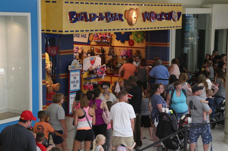 July 12, 2018; Poughkeepsie, NY, USA; Shoppers line up outside the Build-A-Bear Workshop in the Poughkeepsie Galleria. Build-A-Bear ran a promotion where customers pay their age for their bear, and the stores experienced extremely high volume as a result.