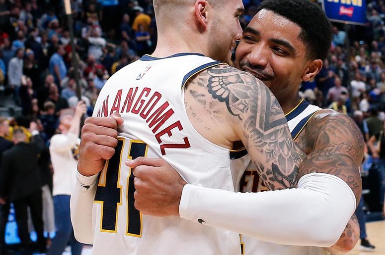 Oct 21, 2018; Denver, CO, USA; Denver Nuggets forward Juancho Hernangomez (41) celebrates with guard Gary Harris (14) after the game against the Golden State Warriors at the Pepsi Center. Mandatory Credit: Isaiah J. Downing-USA TODAY Sports