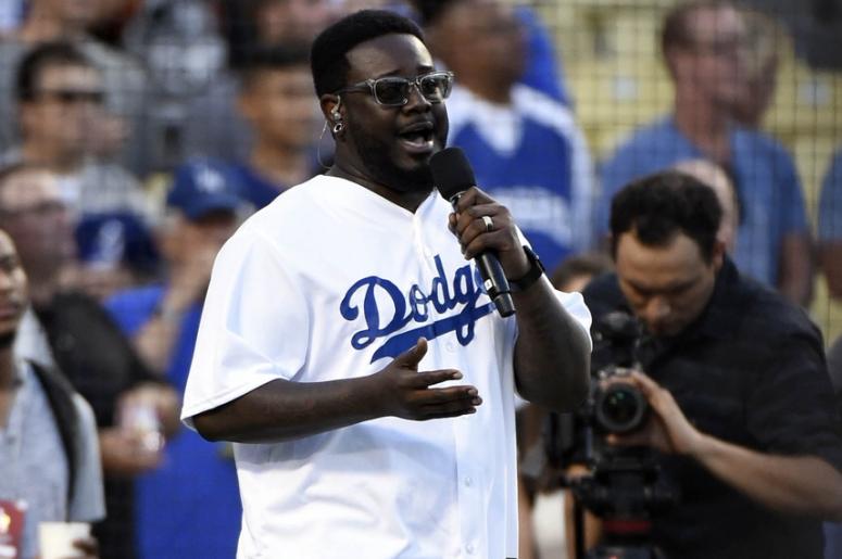Aug 31, 2015; Los Angeles, CA, USA; Recording art T-Pain sings the national anthem before the game between the Los Angeles Dodgers and the San Francisco Giants at Dodger Stadium. Mandatory Credit: Richard Mackson-USA TODAY Sports