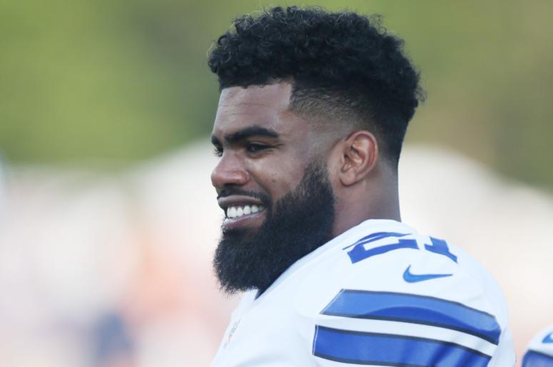Aug 3, 2017; Canton, OH, USA; Dallas Cowboys running back Ezekiel Elliott (21) reacts during warms up before playing the Arizona Cardinals at Tom Benson Hall of Fame Stadium. Mandatory Credit: Charles LeClaire-USA TODAY Sports