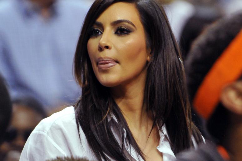 Dec 6, 2012; Miami FL, USA; Television personality Kim Kardashian looks over the New York Knicks bench during the second half of game action against the Miami Heat at American Airlines Arena. Knicks won 112-92. Mandatory Credit: Steve Mitchell-USA TODAY S