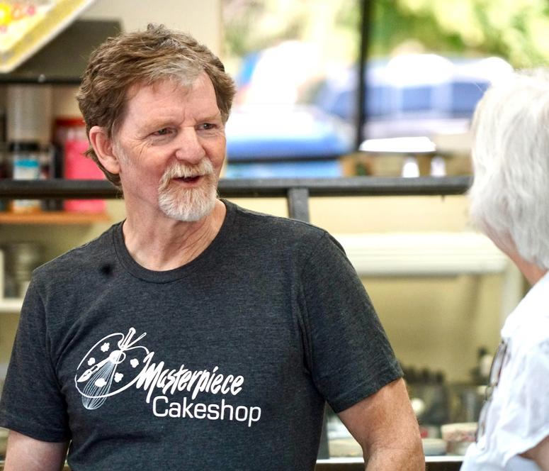 June 4, 2018; Denver, CO, USA; Masterpiece Cakeshop owner Jack Phillips talks with a customer following Monday s Supreme Court ruling on June 4, 2018 in Lakewood, Colo. A divided Supreme Court on Monday absolved the Colorado baker of discrimination for re