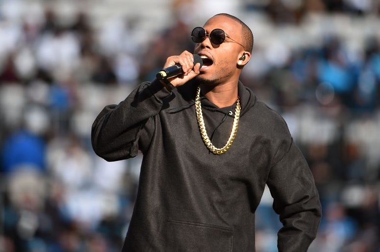 B.o.B performs at halftime of the game between the Seattle Seahawks and the Carolina Panthers B.o.B performs at halftime of the game between the Seattle Seahawks and the Carolina Panthers
