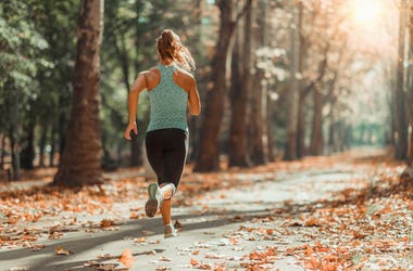 Woman running in autumn Woman running in autumn