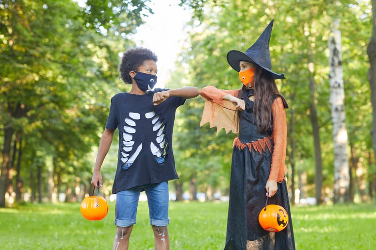 Masked kids trick or treating Masked kids trick or treating