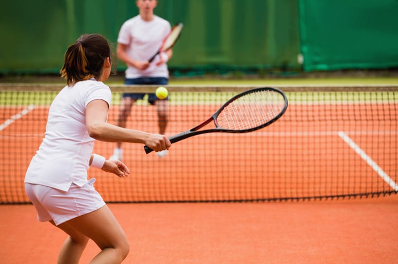Playing tennis Playing tennis