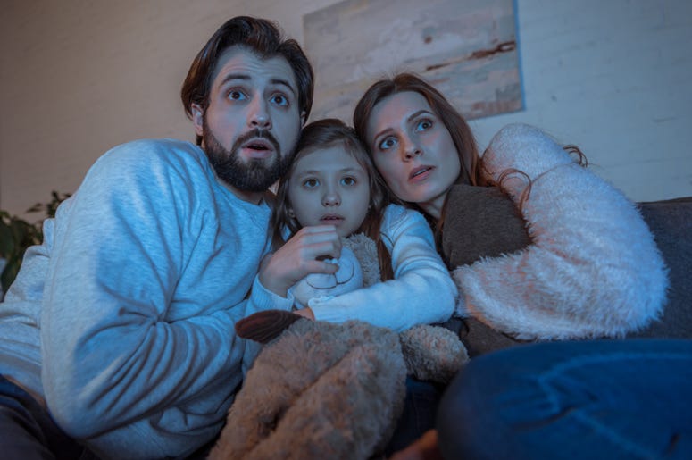Family watching scary movie Family watching scary movie