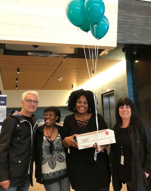 John & Jeanne with donut winners at Holland America Lines John & Jeanne with donut winners at Holland America Lines