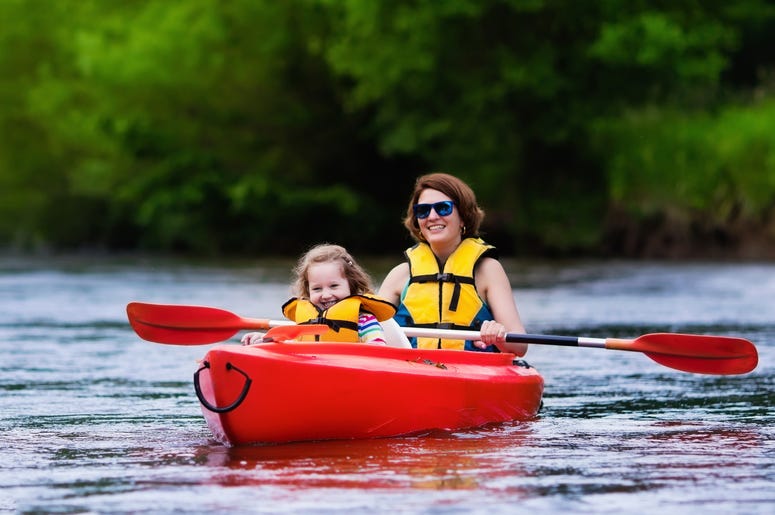 Mom and child in a kayak Mom and child in a kayak