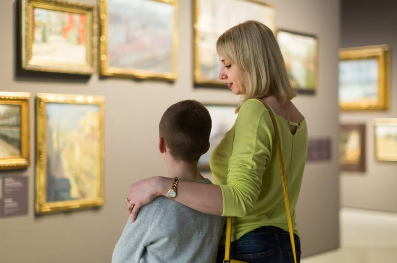 People visiting a museum People visiting a museum