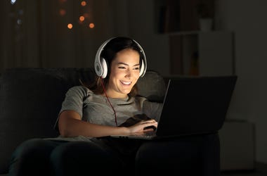 Watching a movie on a laptop Watching a movie on a laptop