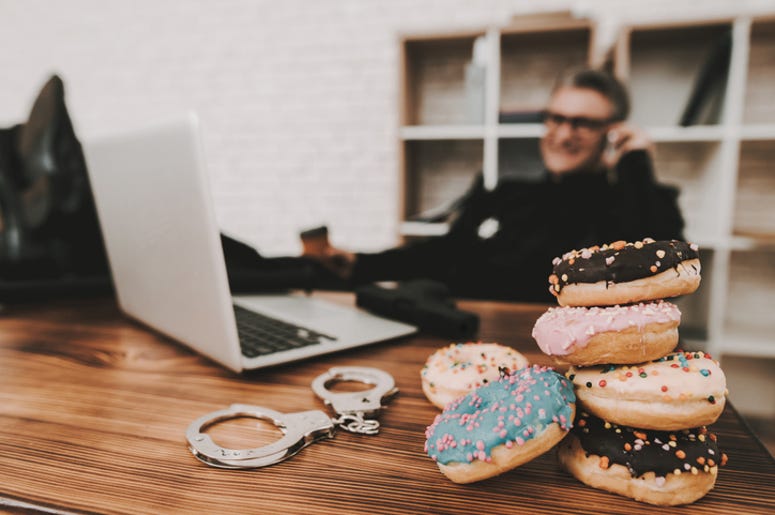 Police Officer with doughnuts