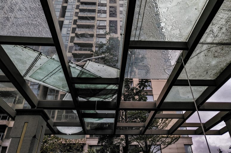 (Freer Law/ iStock/ Getty Plus Images) Broken glass in downtown building after severe weather