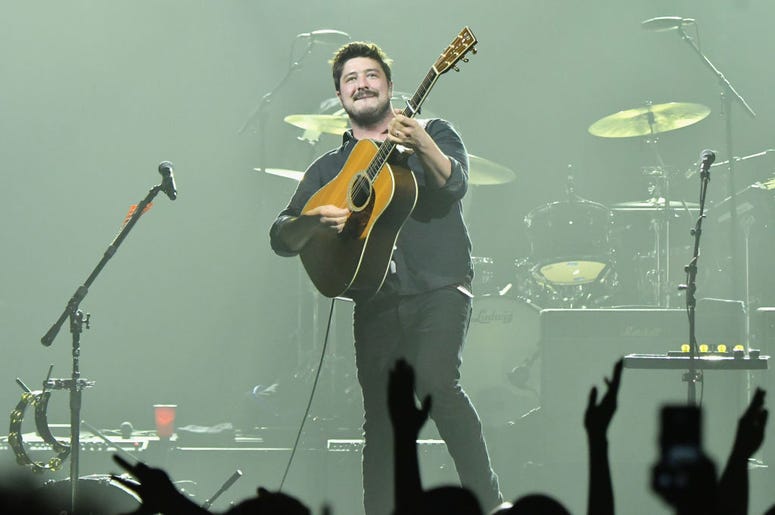 (Mike Coppola/ Getty Images) Marcus Mumford of Mumford & Sons on stage