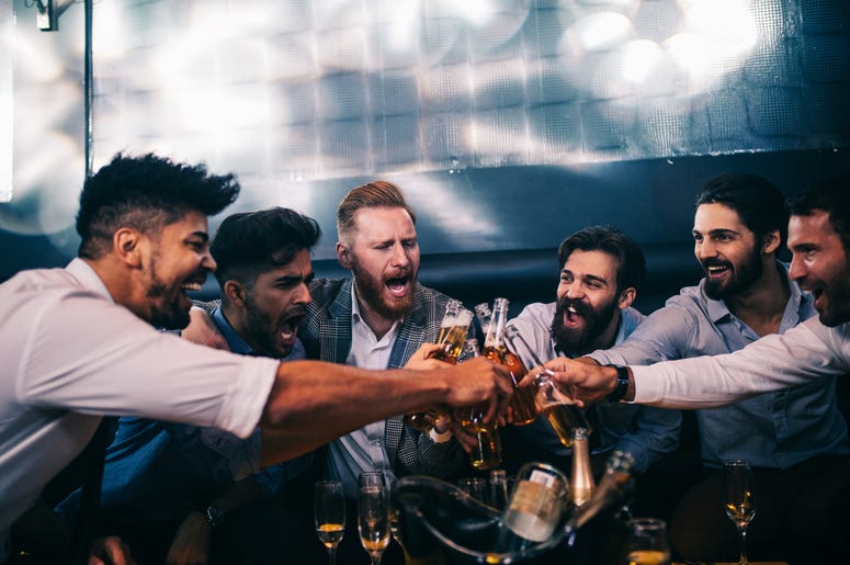 (bernardbobo/ iStock/ Getty Images Plus) Dudes cheering beers at a bachelor party