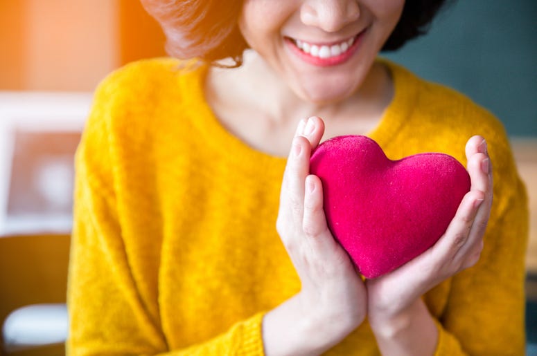 Woman Holding a heart