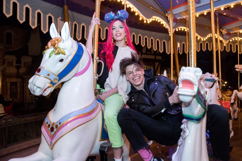 (handout/ Getty Images) Yungblud and Halsey pose with Minnie Mouse