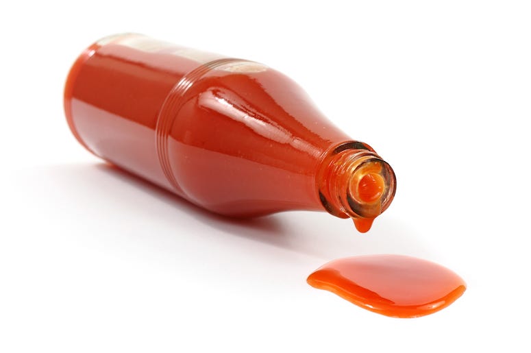 Hot Sauce, Bottle, Tipped, White Background Hot Sauce, Bottle, Tipped, White Background