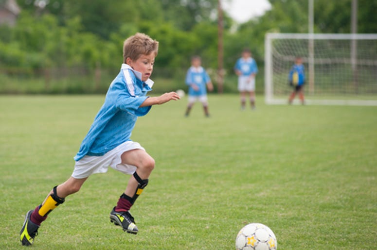 Kid Playing Soccer