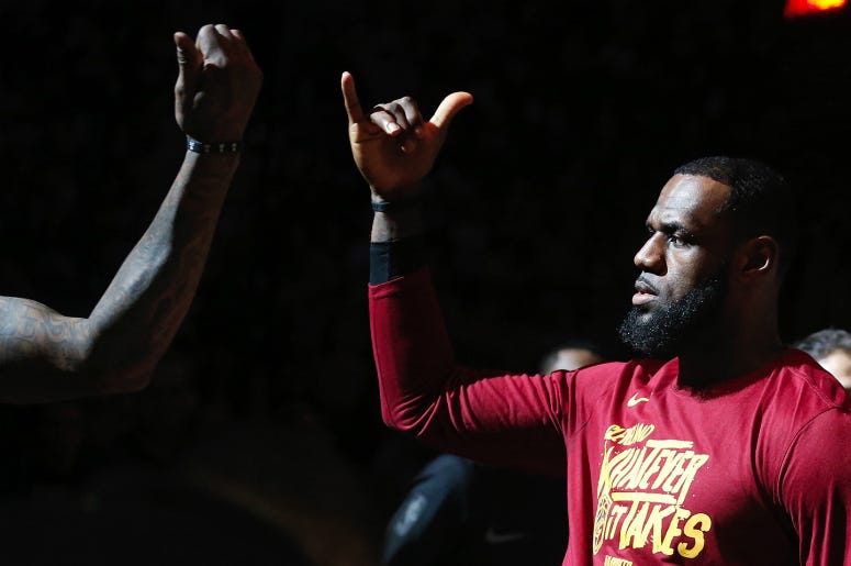 Cleveland Cavaliers forward LeBron James does a handshake with teammate J.R. Smith before the start of Game 7 against the Indiana Pacers LeBron James,Signs,Official,Basketball,LA,Lakers,154 million,Contract,ALT 103.7