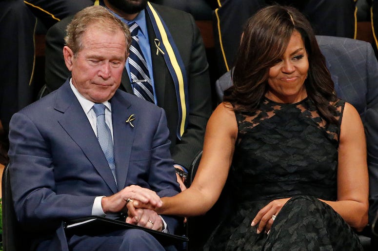Michelle Obama, George W Bush, Holding Hands, Dallas, Meyerson Symphony Center, Memorial, 2016 Michelle Obama, George W Bush, Holding Hands, Dallas, Meyerson Symphony Center, Memorial, 2016