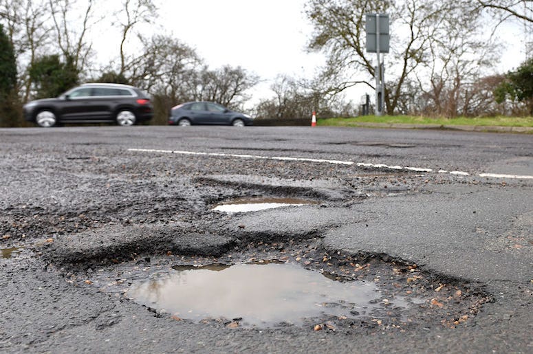 Potholes potholes, michigan, 12 year old, boy, michigan potholes