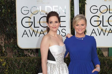 Actress and Co-Host Tina Fey and Amy Poehler arrive at the 72nd Annual Golden Globe Awards Actress and Co-Host Tina Fey and Amy Poehler arrive at the 72nd Annual Golden Globe Awards