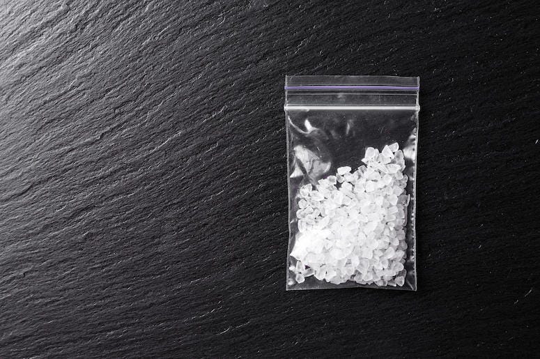Drugs, Meth, Crystal Meth, Plastic Bag, Table, Black Background Drugs, Meth, Crystal Meth, Plastic Bag, Table, Black Background