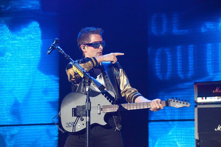 Matt Bellamy of Muse performs onstage during KROQ Almost Acoustic Christmas Matt Bellamy of Muse performs onstage during KROQ Almost Acoustic Christmas