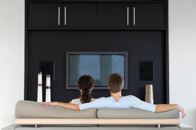 Couple, Man, Woman, Living Room, Couch, Watching TV Couple, Man, Woman, Living Room, Couch, Watching TV